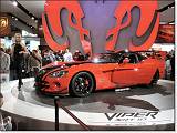  A Dodge Viper SRT10 ACR (American Club Racer), with booth babe.