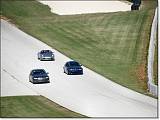  An e46 M3 passes a more pedestrian BMW.